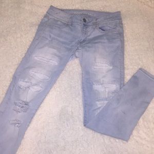 Light blue ripped jeans